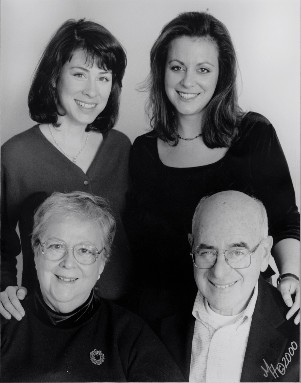 Jenn, her sister Liz, father Ed, and mother Joan (clockwise from top left)